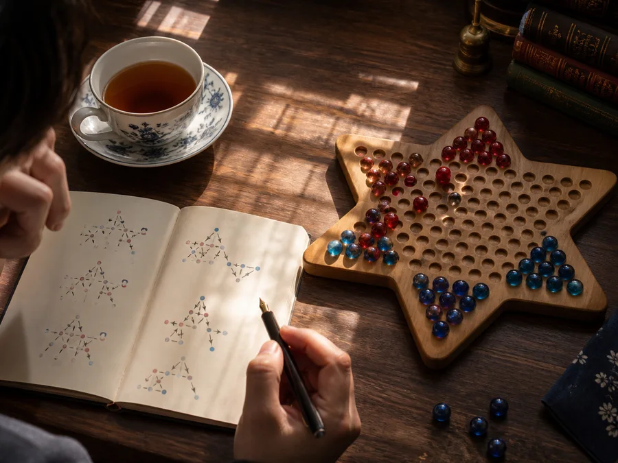 A complete Chinese Checkers move record on a shared device